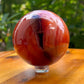 Looking for genuine and stunning Carnelian Crystal Sphere? Shop at Magic Crystals for polished cut base carnelian. We only carry 'AAA' Quality Carnelian from India and Madagascar. Red Agate Crystal Tower for reiki Healing. Free Standing Crystal, Beautiful Display Crystal with FREE SHIPPING AVAILABLE.