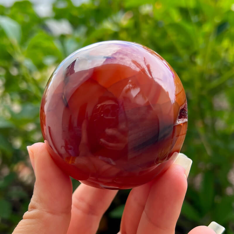 Looking for genuine and stunning Carnelian Crystal Sphere? Shop at Magic Crystals for polished cut base carnelian. We only carry 'AAA' Quality Carnelian from India and Madagascar. Red Agate Crystal Tower for reiki Healing. Free Standing Crystal, Beautiful Display Crystal with FREE SHIPPING AVAILABLE.