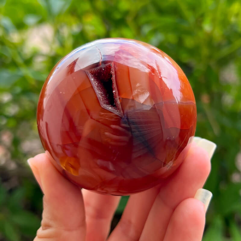 Looking for genuine and stunning Carnelian Crystal Sphere? Shop at Magic Crystals for polished cut base carnelian. We only carry 'AAA' Quality Carnelian from India and Madagascar. Red Agate Crystal Tower for reiki Healing. Free Standing Crystal, Beautiful Display Crystal with FREE SHIPPING AVAILABLE.