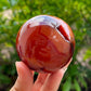 Looking for genuine and stunning Carnelian Crystal Sphere? Shop at Magic Crystals for polished cut base carnelian. We only carry 'AAA' Quality Carnelian from India and Madagascar. Red Agate Crystal Tower for reiki Healing. Free Standing Crystal, Beautiful Display Crystal with FREE SHIPPING AVAILABLE.