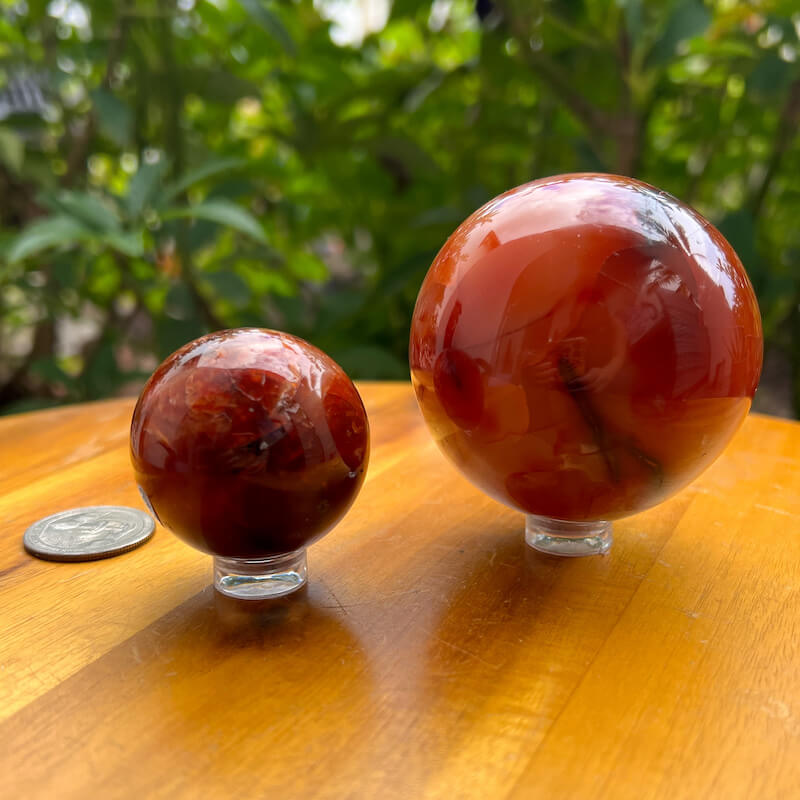 Looking for genuine and stunning Carnelian Crystal Sphere? Shop at Magic Crystals for polished cut base carnelian. We 
only carry 'AAA' Quality Carnelian from India and Madagascar. Red Agate Crystal Tower for reiki Healing. Free Standing Crystal, Beautiful Display Crystal with FREE SHIPPING AVAILABLE.