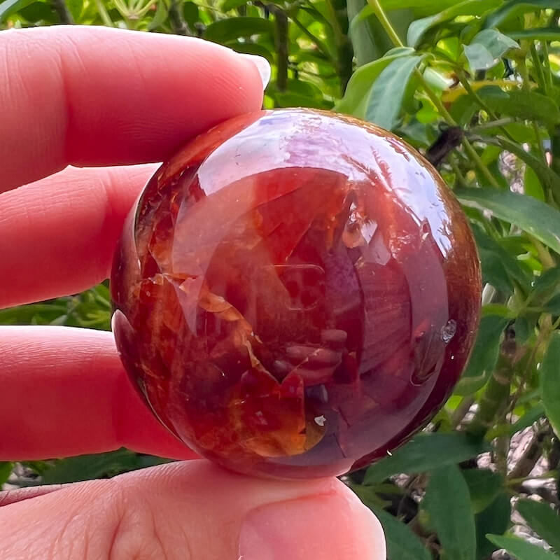 Looking for genuine and stunning Carnelian Crystal Sphere? Shop at Magic Crystals for polished cut base carnelian. We only carry 'AAA' Quality Carnelian from India and Madagascar. Red Agate Crystal Tower for reiki Healing. Free Standing Crystal, Beautiful Display Crystal with FREE SHIPPING AVAILABLE.