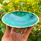 Buy Malachite Home decor? Shop at Magic Crystals for Genuine Malachite Round Bowl - Malachite from Congo, Circular Malachite Bowl with Gold Rim Great for Crystal Grids. malachite aesthetic, malachite jewelry, malachite stone, malachite crystal meaning. Malachite is known as a protection stone.