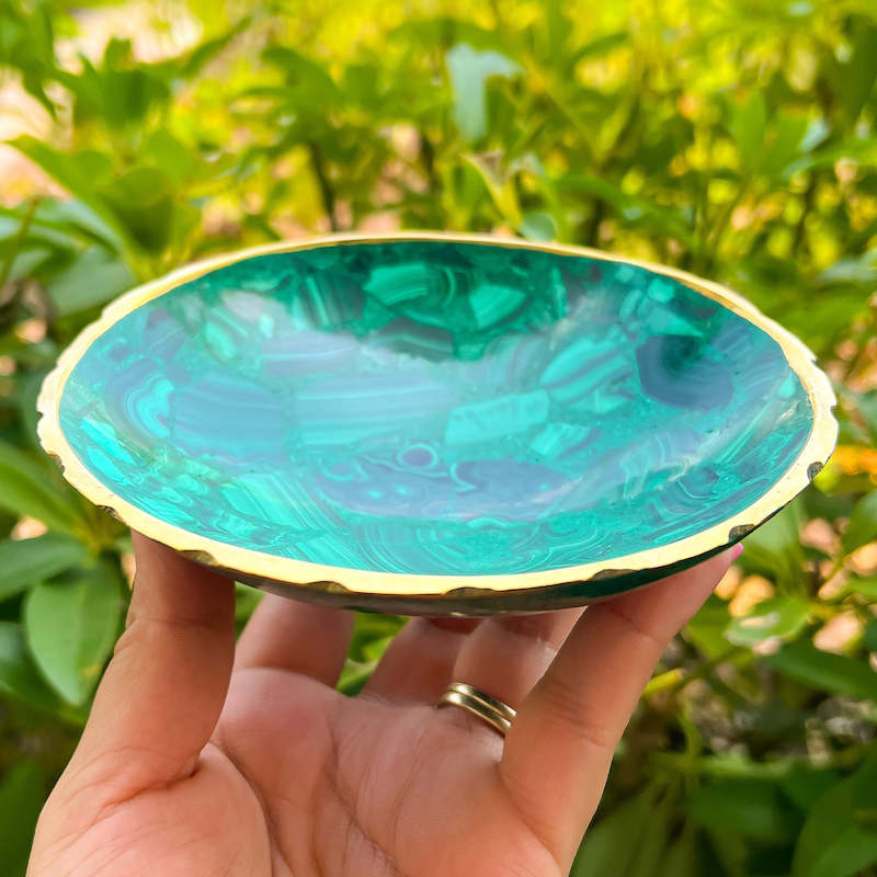 Buy Malachite Home decor? Shop at Magic Crystals for Genuine Malachite Round Bowl - Malachite from Congo, Circular Malachite Bowl with Gold Rim Great for Crystal Grids. malachite aesthetic, malachite jewelry, malachite stone, malachite crystal meaning. Malachite is known as a protection stone.