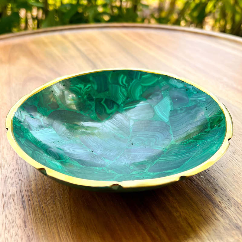 Buy Malachite Home decor? Shop at Magic Crystals for Genuine Malachite Round Bowl - Malachite from Congo, Circular Malachite Bowl with Gold Rim Great for Crystal Grids. malachite aesthetic, malachite jewelry, malachite stone, malachite crystal meaning. Malachite is known as a protection stone.