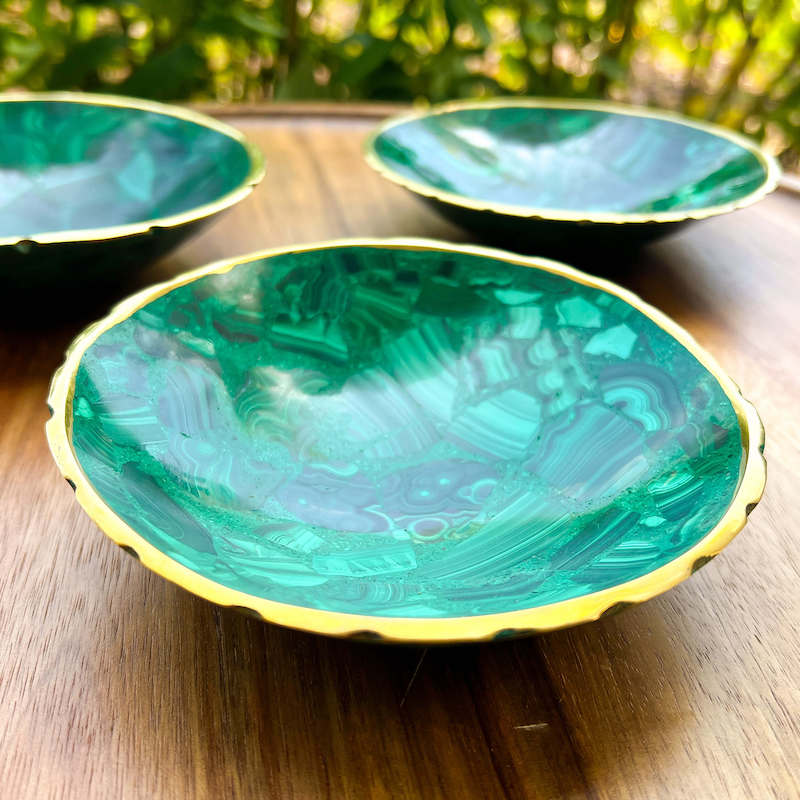 Buy Malachite Home decor? Shop at Magic Crystals for Genuine Malachite Round Bowl - Malachite from Congo, Circular Malachite Bowl with Gold Rim Great for Crystal Grids. malachite aesthetic, malachite jewelry, malachite stone, malachite crystal meaning. Malachite is known as a protection stone.