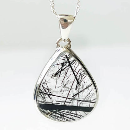 Tourmalinated Quartz Sterling Silver - Quartz Jewelry, a combination of Clear Quartz with Black Tourmaline inclusions. Check out Magic Crystals for the very best selection of tourmalinated quartz. Tourmaline Quartz necklace,EMF Protection,Grounding. pendant quartz tourmaline.Black tourmaline and clear quartz necklace. Tourmalinated-Quartz-SterlingSilver-Pendant -B