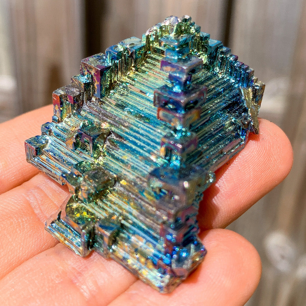 Looking for grade A quality Bismuth? Shop at Magic Crystals for Bismuth Crystals Cluster Specimen - Lab-Grown Stone. Brand new, 100% Bismuth rainbow crystals. They display beautifully at all angles. FREE SHIPPING AVAILABLE. Crystal Display Cluster Pyramid Metal Decor Rocks Minerals Specimen