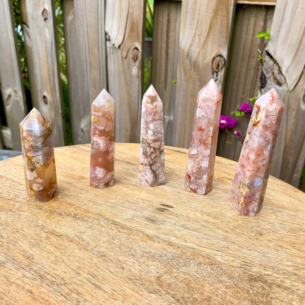 Pink flower agate shops tower with golden healer