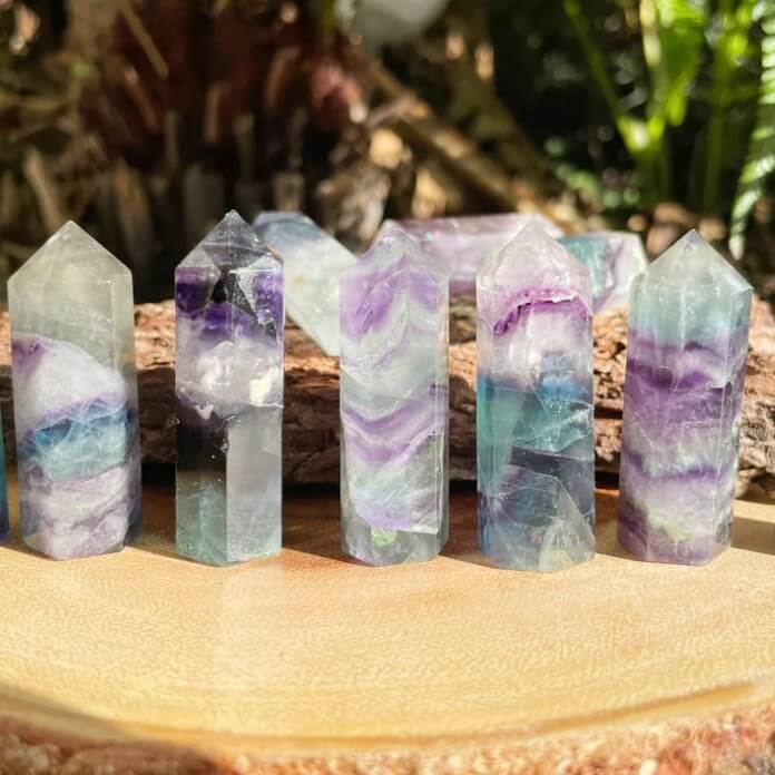 Looking for Natural Watermelon Fluorite Obelisk - Fluorite Towers? Shop at Magic Crystals for Fluorite Polished Point, Fluorite Stone, Purple Fluorite Point, Stone Point, Crystal Point, Fluorite Tower, Power Point. Natural Fluorite Gemstone for INTUITION. Magiccrystals.com offers the best quality gemstones.