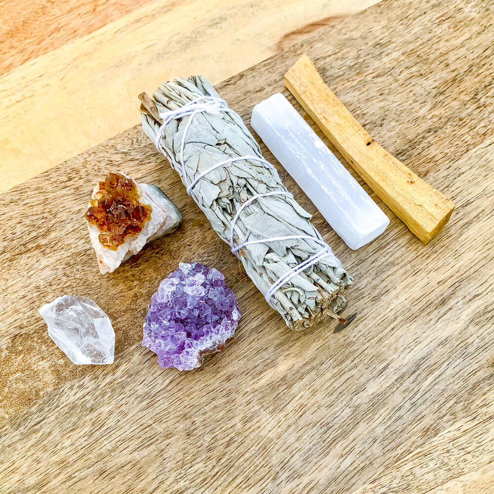 Looking for a cleansing kit to bless your home? Shop at Magic Crystals Bundle for Home Blessings Set! Cleansing Crystals include selenite, citrine, amethyst, clear quartz, and Sage. This Kit is the perfect gift for Her. Sage is great when moving to a new home. Palo Santo has amazing spiritual and emotional healing.