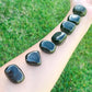 Buy Black Jet Tumbled Stones | Jet Polished Gemstones | Bulk Crystals. Jet is a protective warrior stone. It helps you get out of your head and back down to earth. Jet Tumbled Stone | Gemstone Healing, Chakra Stones, Protection Crystals, Wicca, Witchcraft Crystals, Collectable Stones, Pagan tools at Magic Crystals.