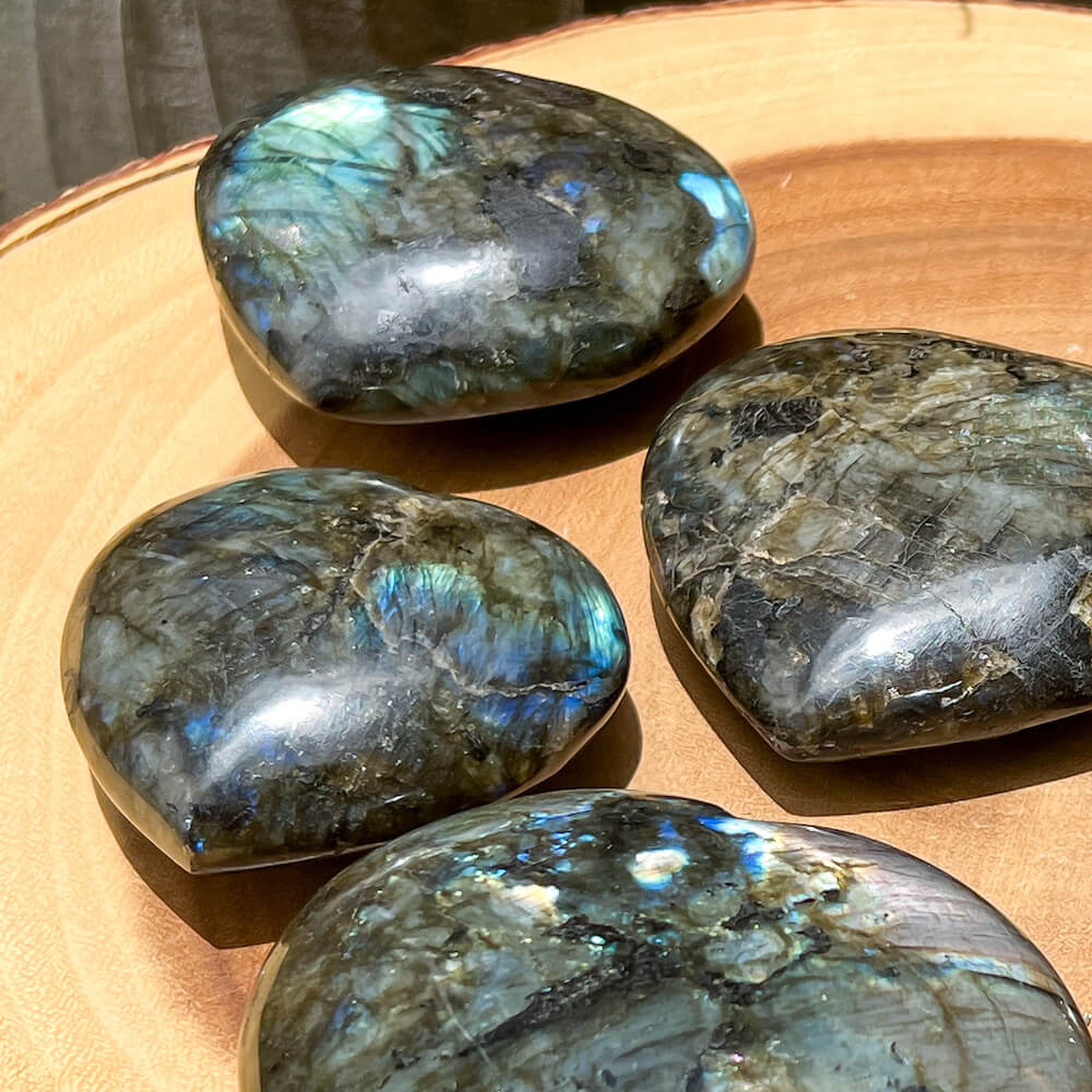 Looking for polished labradorite? Shop at Magic Crystals for Labradorite Stone Heart - Labradorite Carving. Empathetic, supporting, and glowing with soft, pretty color, this Labradorite palm stone is a wonderful crystal gift for someone you love. FREE SHIPPING available.