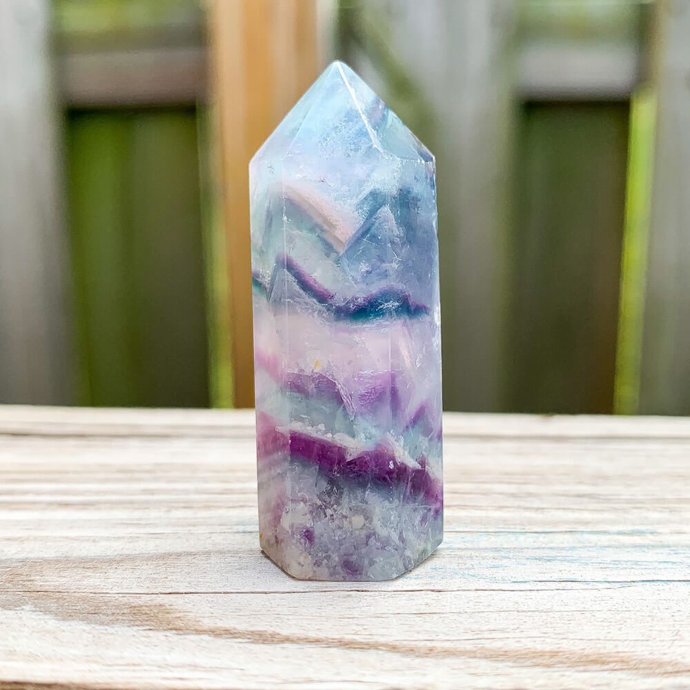 Looking for Natural Watermelon Fluorite Obelisk - Fluorite Towers? Shop at Magic Crystals for Fluorite Polished Point, Fluorite Stone, Purple Fluorite Point, Stone Point, Crystal Point, Fluorite Tower, Power Point. Natural Fluorite Gemstone for INTUITION. Magiccrystals.com offers the best quality gemstones.