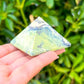 Looking for Green Serpentine Pyramid? Shop at Magiccrystals.com for Genuine Green Peruvian Serpentine Magnatite Pyramid - Serpentine Pyramid - Stone Point. Magic Crystals FREE SHIPPING on quality crystals. Serpentine is associated with the heart chakra and increases love and nurturing.