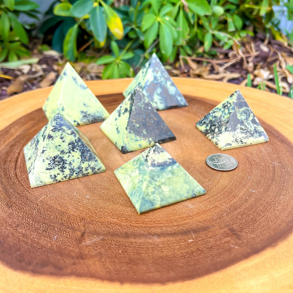 Looking for Green Serpentine Pyramid? Shop at Magiccrystals.com for Genuine Green Peruvian Serpentine Magnatite Pyramid - Serpentine Pyramid - Stone Point. Magic Crystals FREE SHIPPING on quality crystals. Serpentine is associated with the heart chakra and increases love and nurturing.