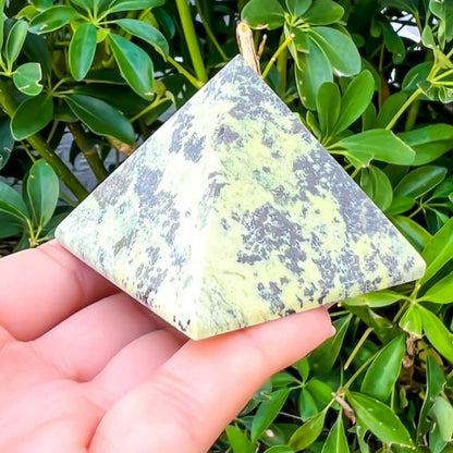 Looking for Green Serpentine Pyramid? Shop at Magiccrystals.com for Genuine Green Peruvian Serpentine Magnatite Pyramid - Serpentine Pyramid - Stone Point. Magic Crystals FREE SHIPPING on quality crystals. Serpentine is associated with the heart chakra and increases love and nurturing.